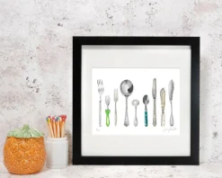 Corinne Alexander Art-A Handful of Cutlery Framed Print by